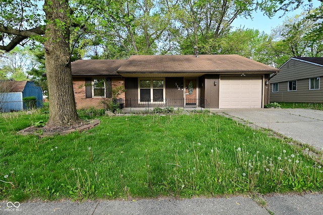 ranch-style home featuring brick siding, a garage, a porch, a front yard, and concrete driveway