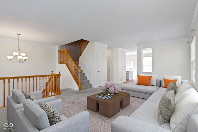 carpeted living area featuring crown molding, stairway, and a chandelier