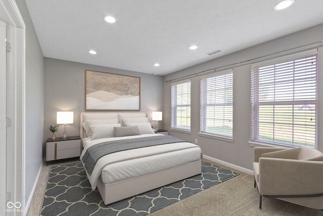 bedroom featuring baseboards, carpet, recessed lighting, and visible vents