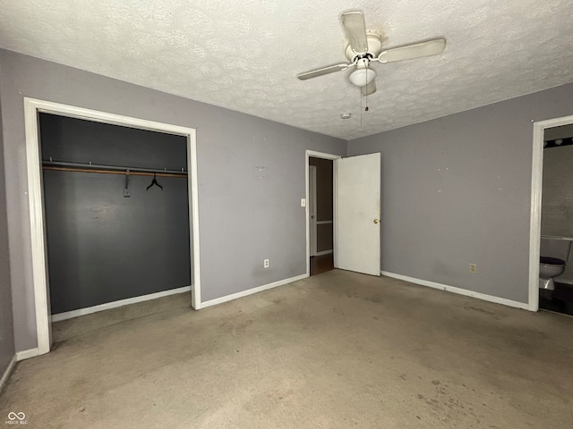 unfurnished bedroom with a textured ceiling, baseboards, a ceiling fan, and a closet