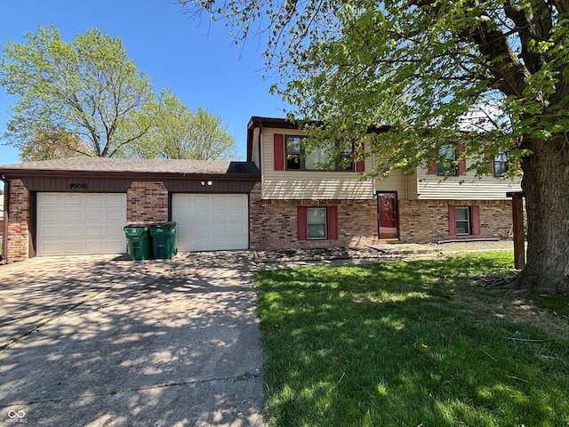 split level home featuring brick siding, a garage, and concrete driveway