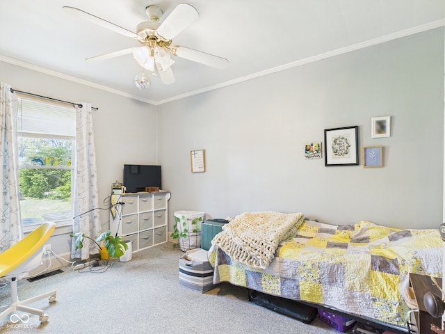 bedroom featuring carpet floors, ornamental molding, a ceiling fan, and visible vents