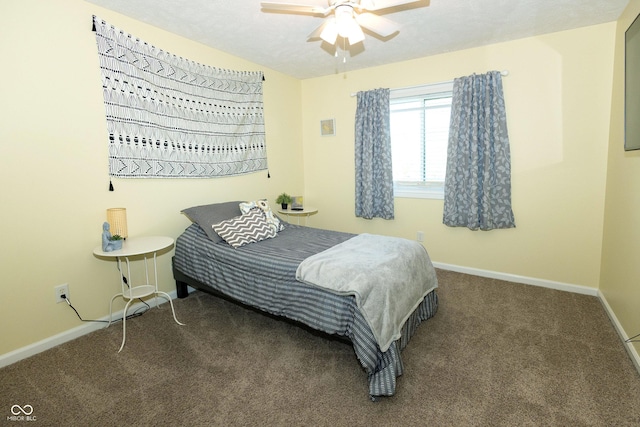 bedroom with carpet flooring, baseboards, and ceiling fan