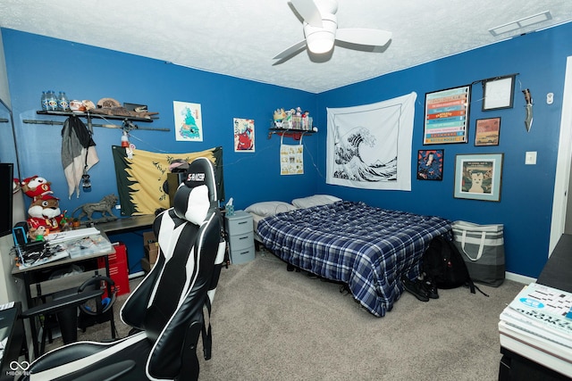 bedroom with carpet floors, a ceiling fan, a textured ceiling, and visible vents