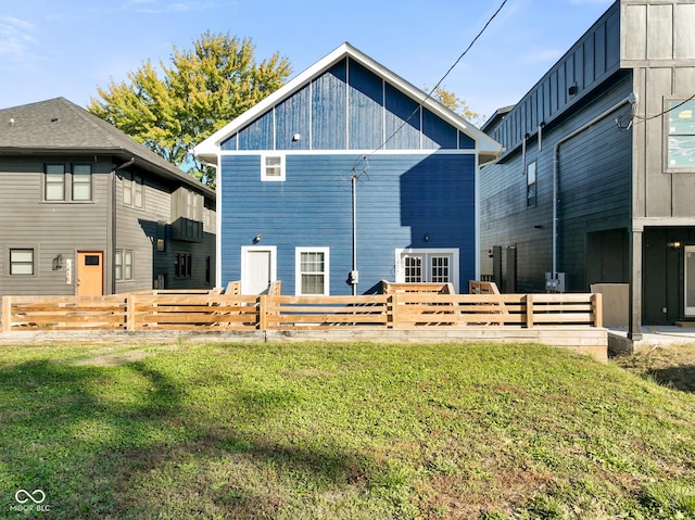 1417 E Michigan St, Indianapolis, IN 46201 - rear view of property with a yard and fence