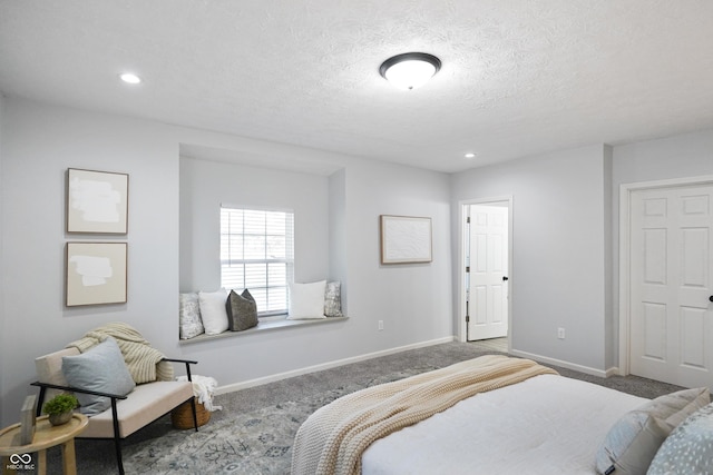 1417 E Michigan St, Indianapolis, IN 46201 - bedroom with baseboards, carpet flooring, recessed lighting, and a textured ceiling