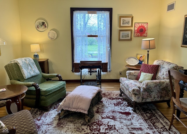 2405 Sycamore St, Columbus, IN 47201 - living area with wood finished floors and baseboards