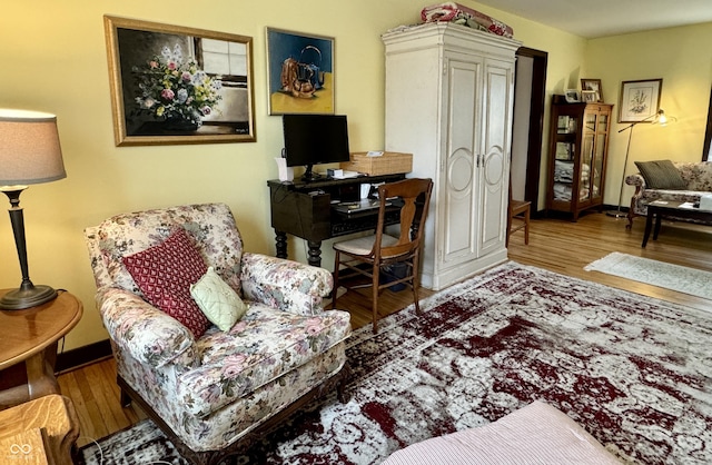 2405 Sycamore St, Columbus, IN 47201 - living room featuring wood finished floors and baseboards