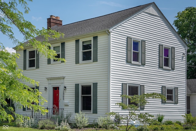 2405 Sycamore St, Columbus, IN 47201 - colonial inspired home featuring a chimney