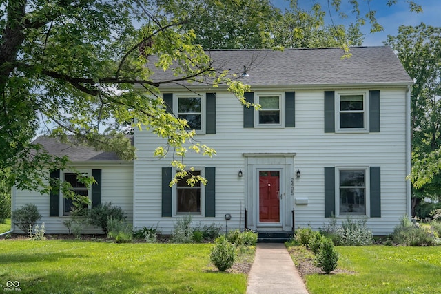 2405 Sycamore St, Columbus, IN 47201 - colonial home with a front yard and roof with shingles