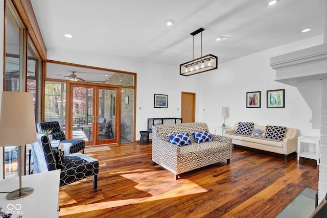 living room with recessed lighting, ceiling fan, and wood finished floors