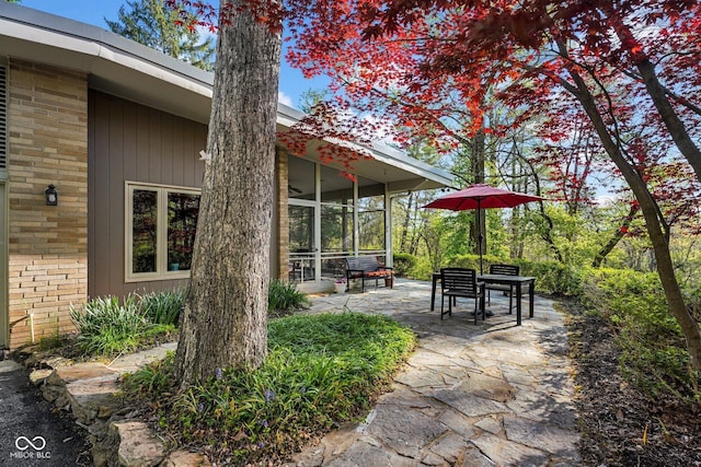 view of home's community with a patio