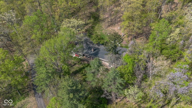 aerial view featuring a view of trees