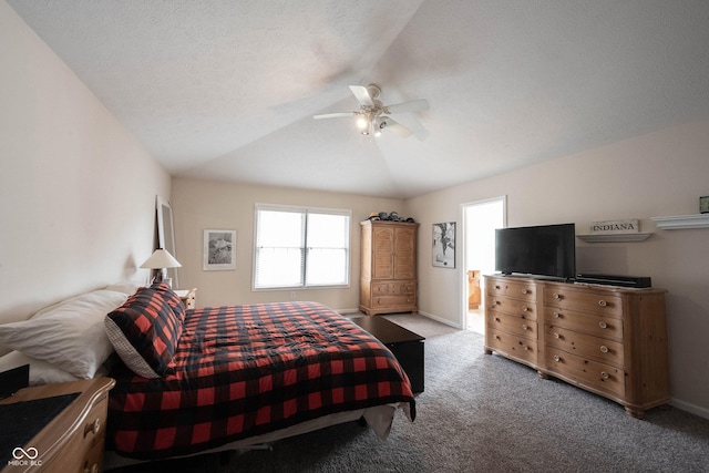 bedroom with carpet floors, a ceiling fan, multiple windows, and lofted ceiling