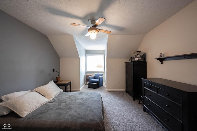 bedroom with ceiling fan, light colored carpet, and lofted ceiling