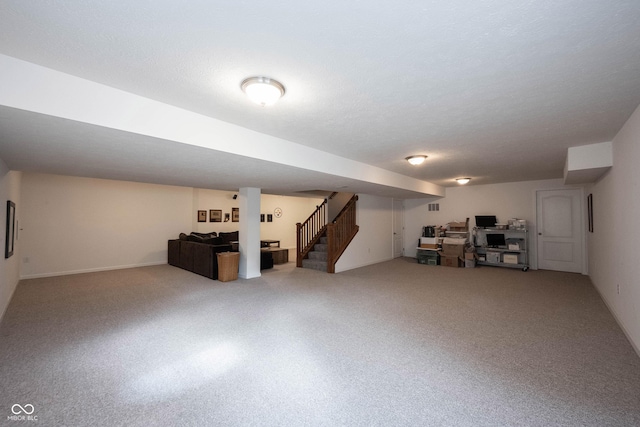 finished basement featuring stairs