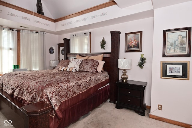 114 E 27th St, Indianapolis, IN 46205 - bedroom with light carpet, vaulted ceiling, and baseboards