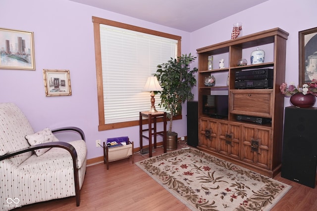 114 E 27th St, Indianapolis, IN 46205 - living area with wood finished floors and baseboards