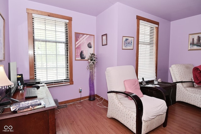 114 E 27th St, Indianapolis, IN 46205 - sitting room featuring wood finished floors, plenty of natural light, baseboards, and a desk