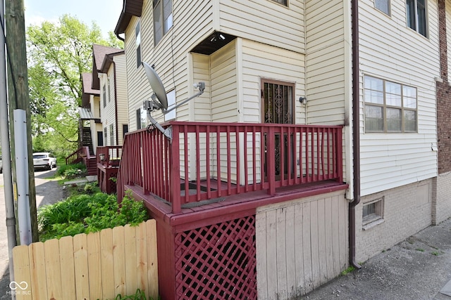 114 E 27th St, Indianapolis, IN 46205 - entrance to property with a wooden deck