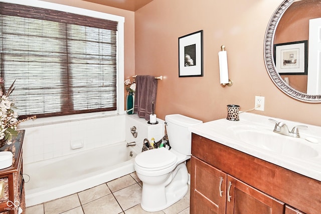 114 E 27th St, Indianapolis, IN 46205 - full bathroom featuring tile patterned flooring, healthy amount of natural light, vanity, and a bath