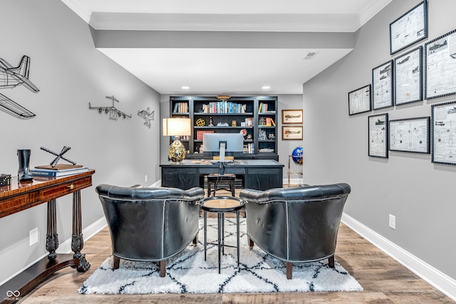 interior space featuring crown molding, recessed lighting, baseboards, and wood finished floors
