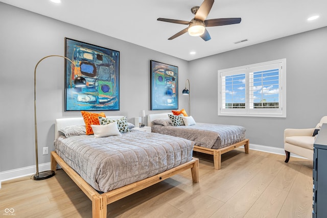 bedroom with recessed lighting, baseboards, visible vents, and light wood-style floors