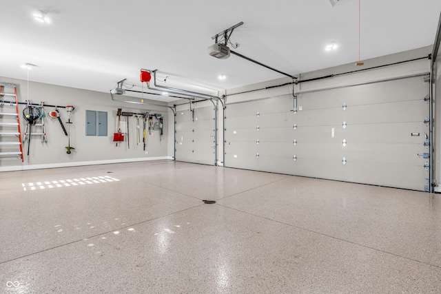 garage featuring a garage door opener and electric panel