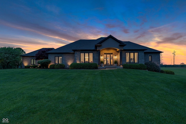 view of front of home featuring a yard
