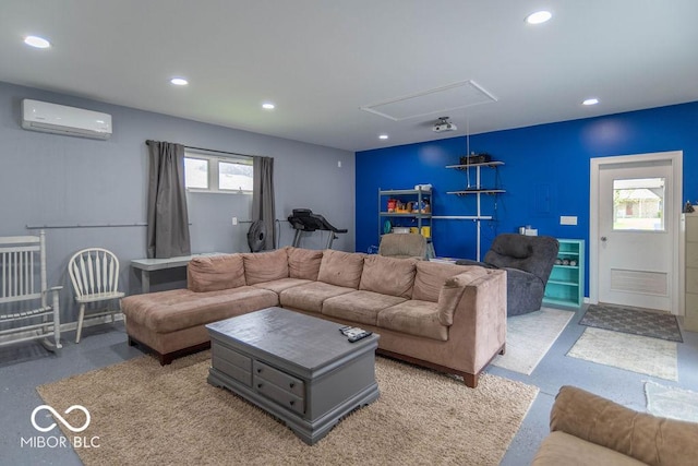 living room featuring recessed lighting, a wall mounted AC, and attic access