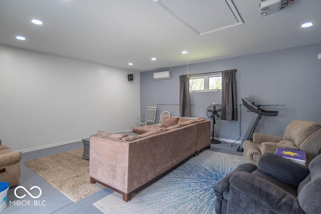 living room with recessed lighting, attic access, baseboards, and a wall mounted AC