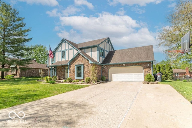 tudor house featuring concrete driveway, brick siding, an attached garage, and a front lawn