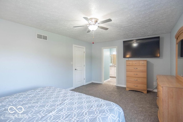 bedroom featuring ceiling fan, a textured ceiling, visible vents, baseboards, and carpet