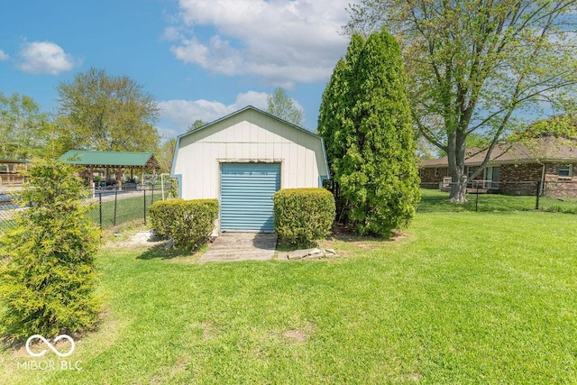 view of outbuilding with fence and an outdoor structure