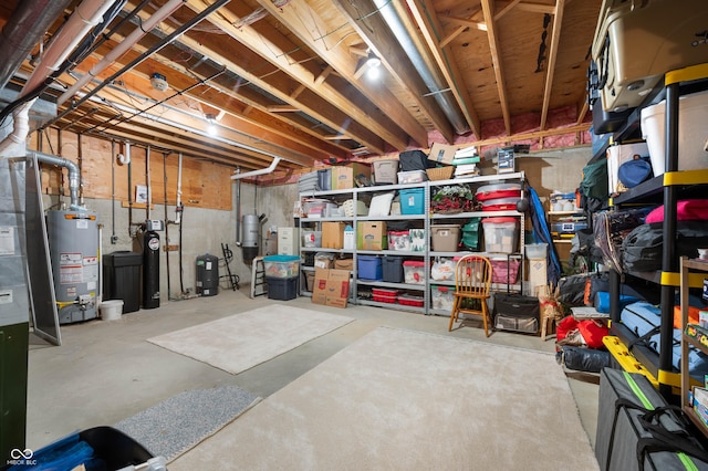 unfinished basement featuring gas water heater