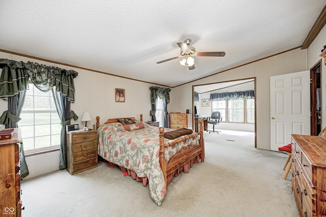 bedroom with crown molding, a textured ceiling, vaulted ceiling, and light carpet