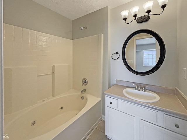 6628 Dunsdin Dr, Plainfield, IN 46168 - full bath with a textured ceiling, a combined bath / shower with jetted tub, tile patterned floors, and vanity