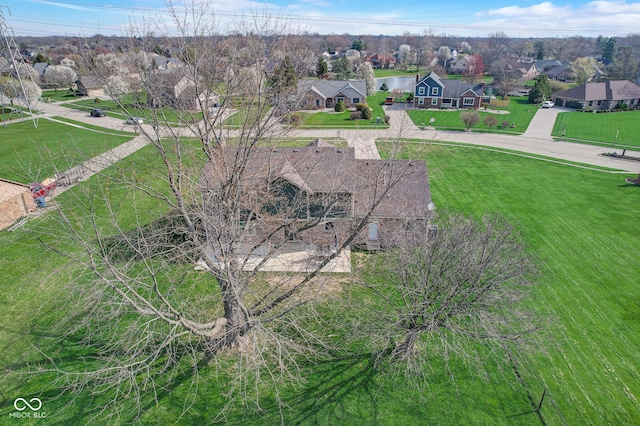 birds eye view of property with a residential view