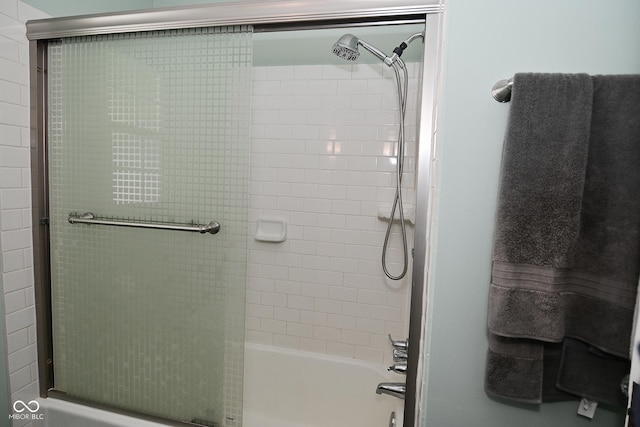 full bath featuring enclosed tub / shower combo