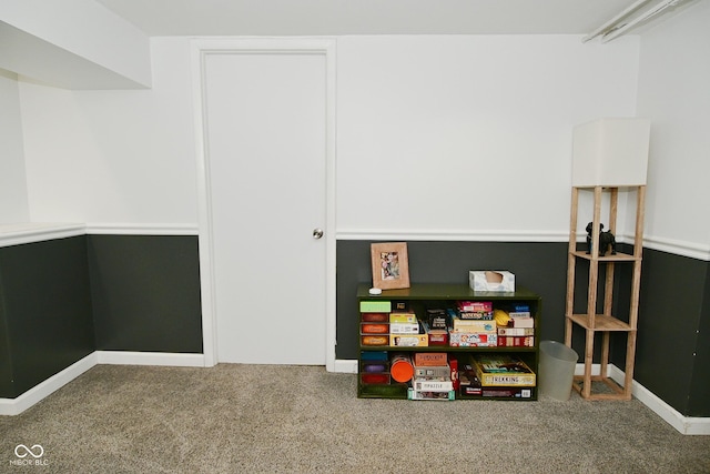 game room featuring baseboards and carpet flooring