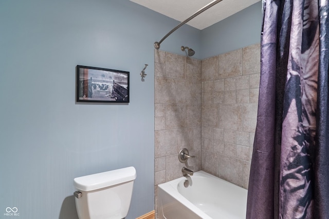 full bath featuring shower / bath combo and toilet