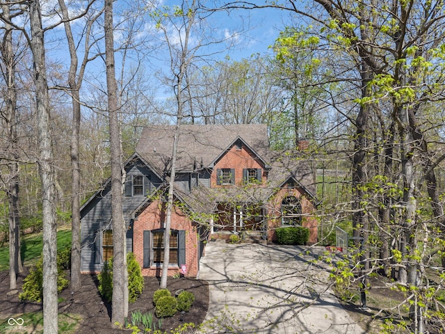 view of front of home with brick siding