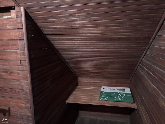 interior space with wood walls and a sauna