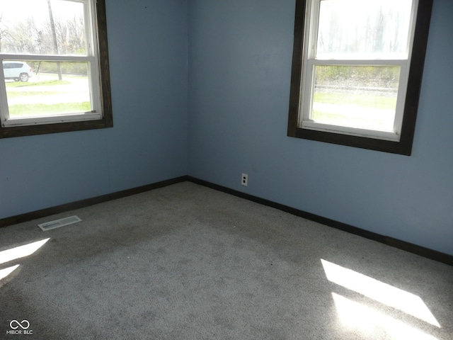 215 W N G St, Gas City, IN 46933 - carpeted empty room featuring baseboards and visible vents