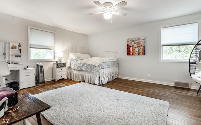 440 E 82nd St, Indianapolis, IN 46240 - bedroom with baseboards, dark wood-style floors, and a ceiling fan