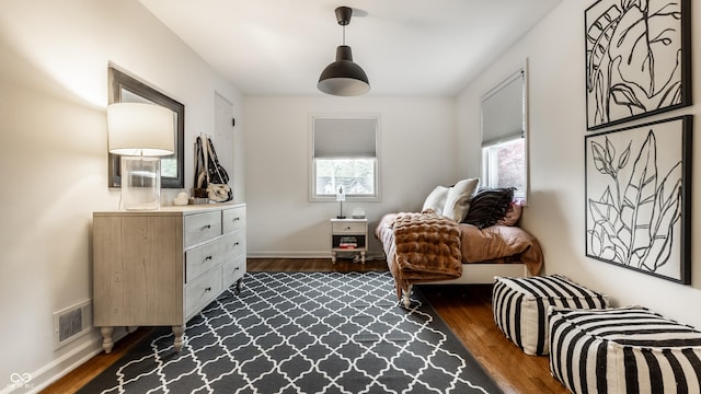 440 E 82nd St, Indianapolis, IN 46240 - sitting room with dark wood-style floors and baseboards