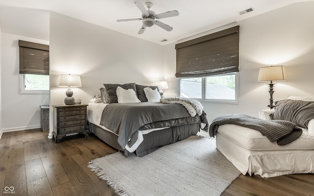440 E 82nd St, Indianapolis, IN 46240 - bedroom with wood finished floors, baseboards, and a ceiling fan