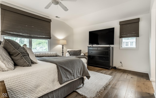 440 E 82nd St, Indianapolis, IN 46240 - bedroom with lofted ceiling, wood-type flooring, baseboards, and ceiling fan
