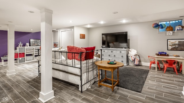 440 E 82nd St, Indianapolis, IN 46240 - living room with wood tiled floors, baseboards, recessed lighting, and ornate columns