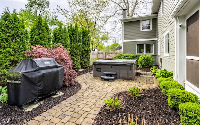 440 E 82nd St, Indianapolis, IN 46240 - view of patio featuring a hot tub and fence